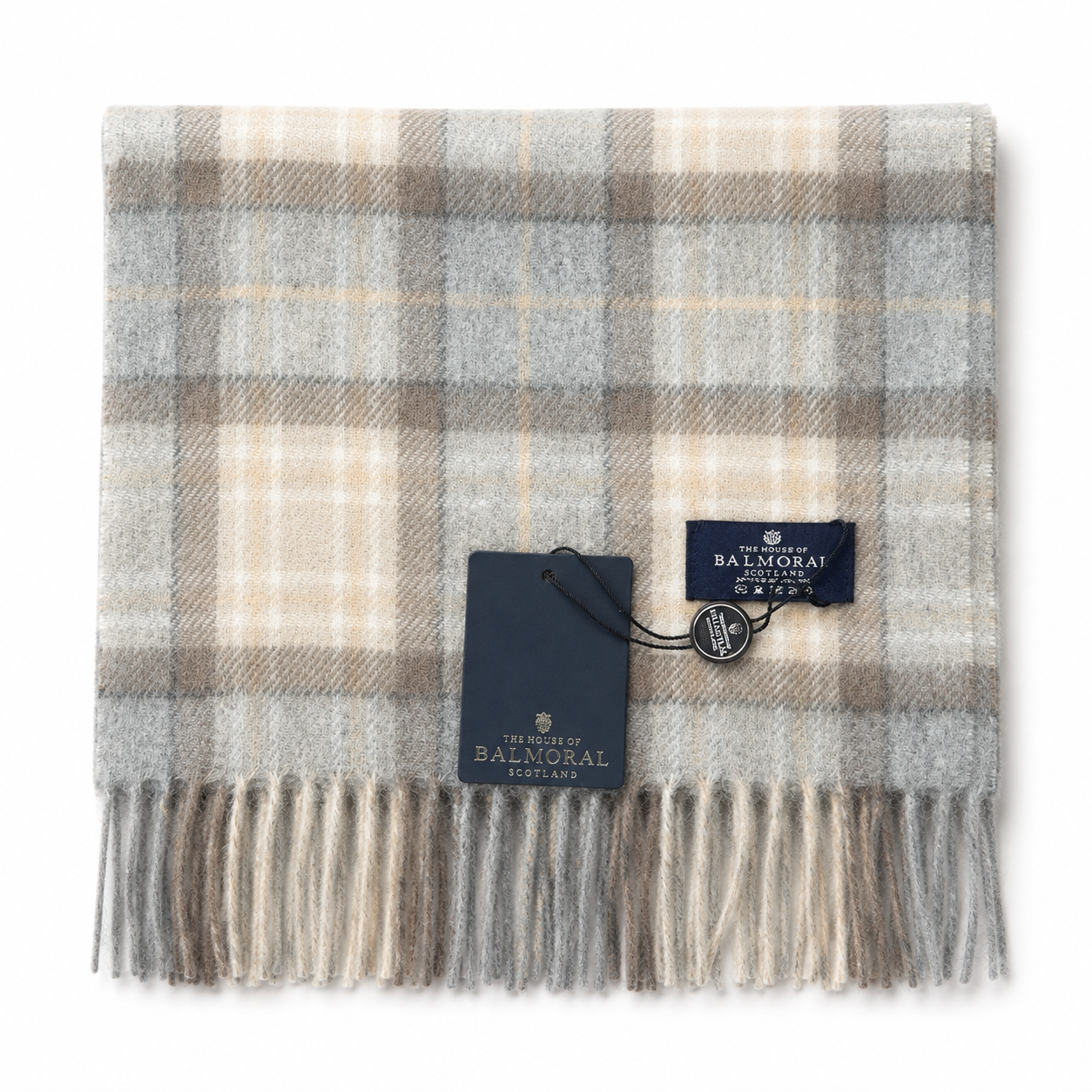 Folded House of Balmoral grey, beige and cream tartan scarf with fringed ends