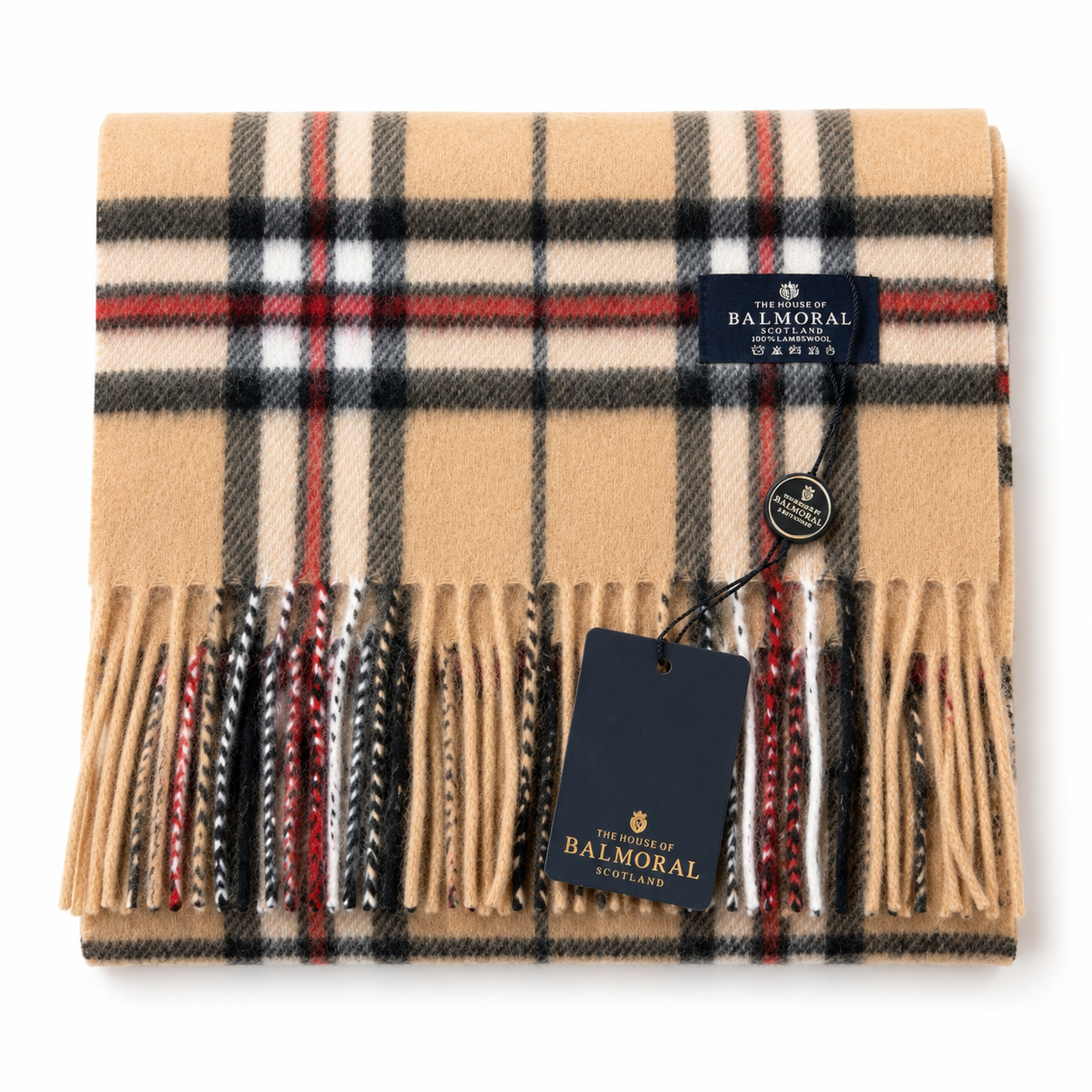     Close-up of Camel Thomson 100% lambswool scarf showing camel, black, white and red tartan with fringe