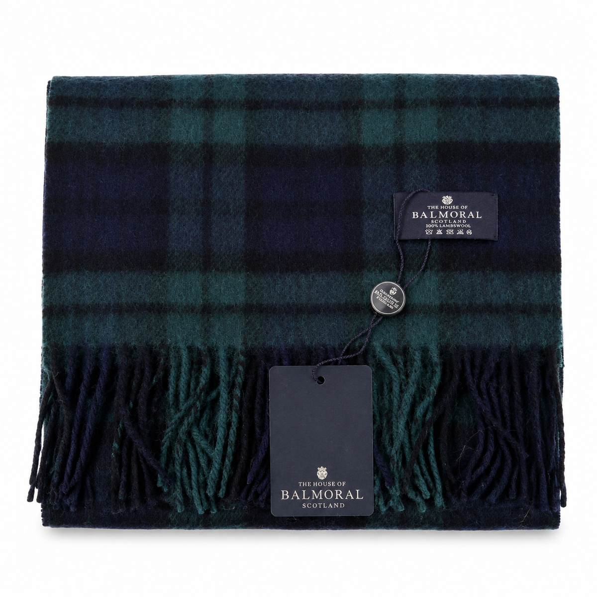 Folded Black Watch tartan 100% lambswool scarf by The House of Balmoral with branded tags and fringed ends