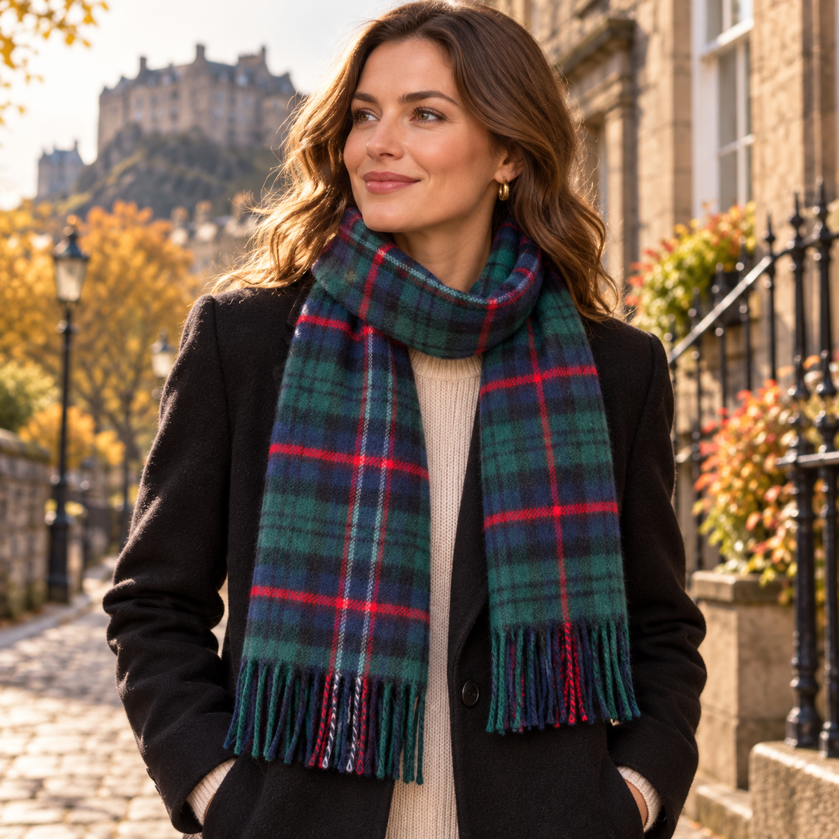     Woman wearing a Fraser Scott Scottish National tartan lambswool scarf with a black winter coat