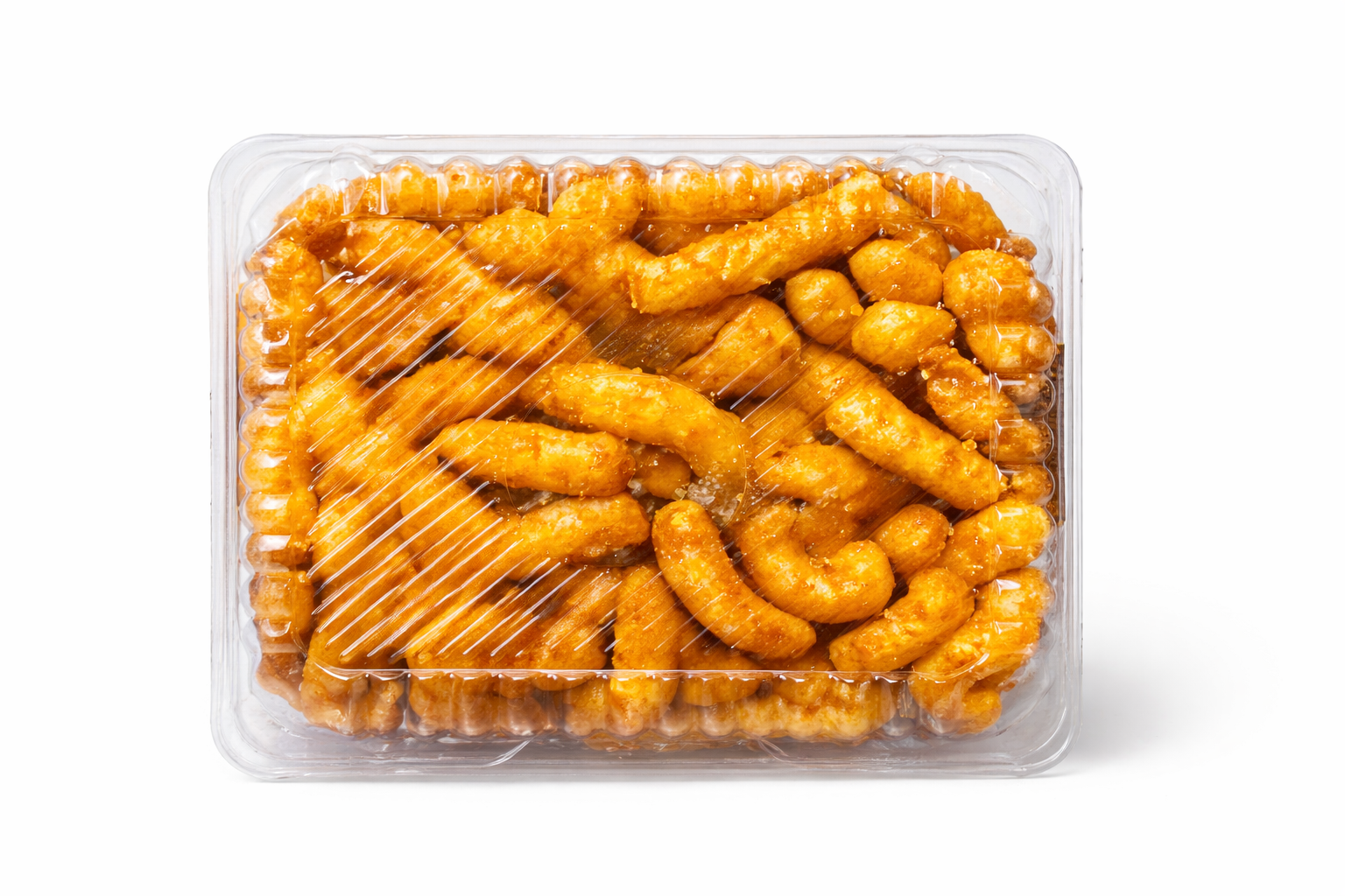 Close up of caramel coated corn puffs with glossy sugar glaze texture