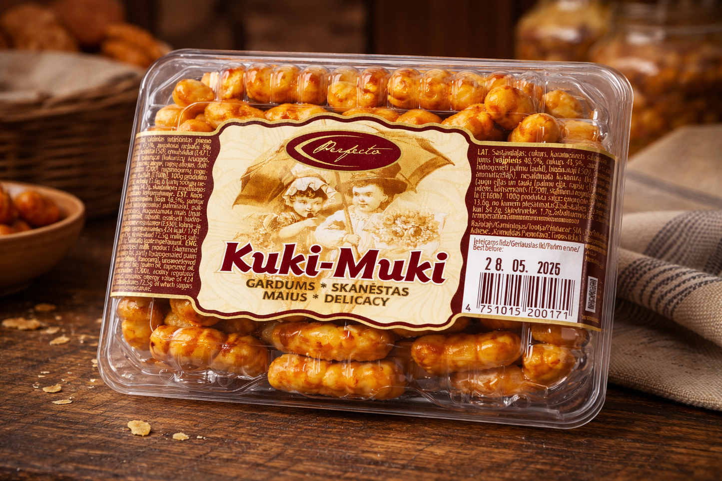 Kuki-Muki caramel corn puffs sweet Eastern European snack on wooden table