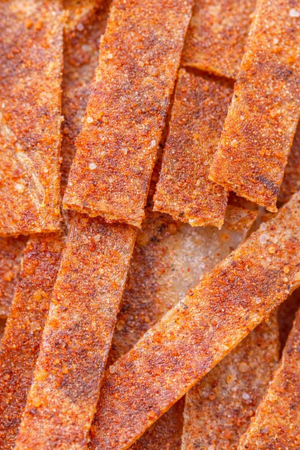 coral blue whiting strips with pepper dried seafood snack 37g salted dried fish package close up texture and seasoning