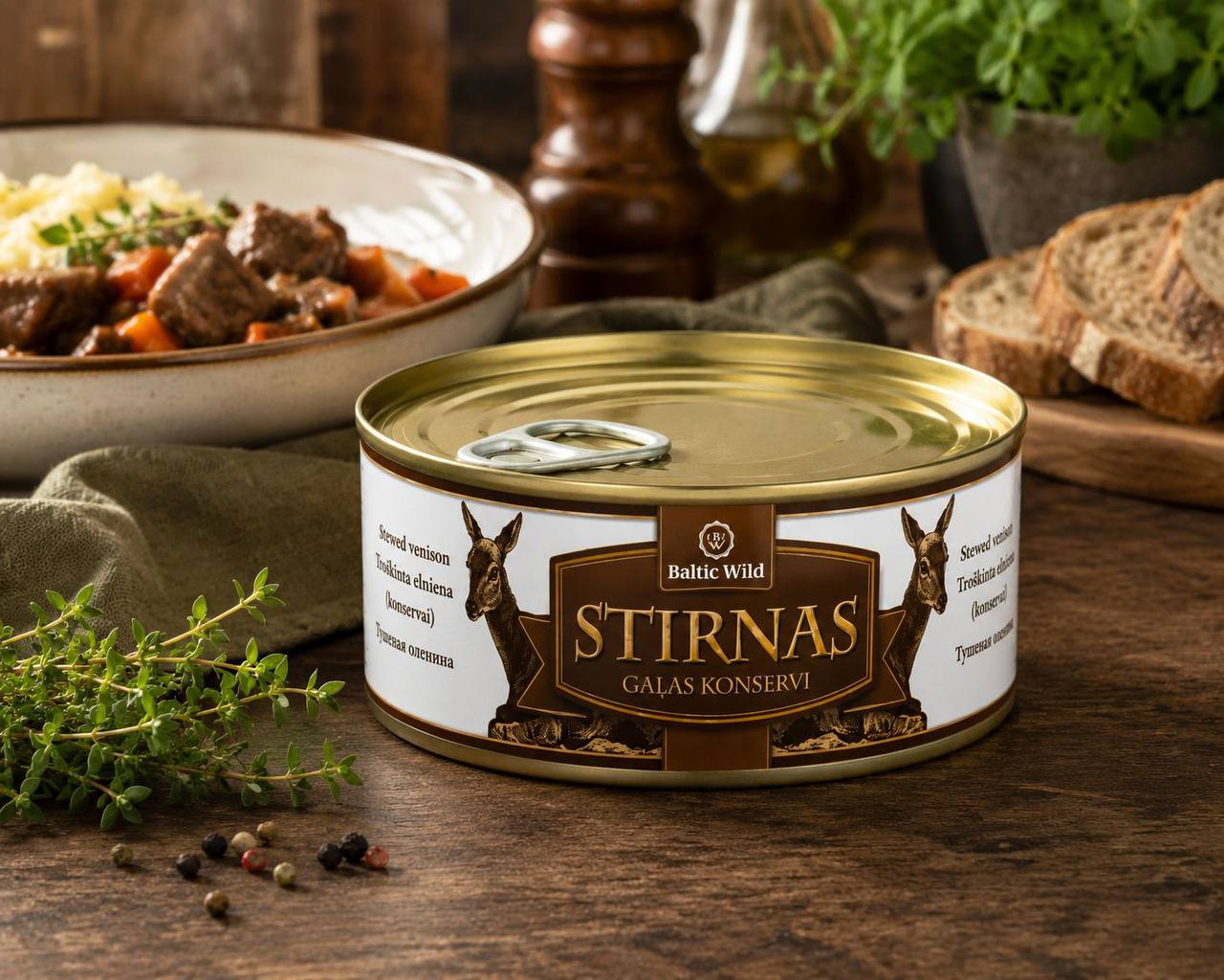Baltic Wild Stewed Roe Deer Meat serving suggestion with mashed potato, bread and herbs